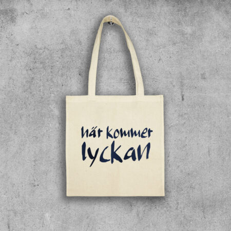 Tygpåse Här kommer lyckan